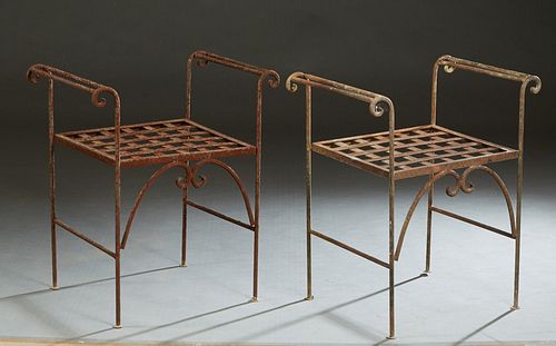 Pair of Wrought Iron Strapwork Benches, 20th/21st c., the curved arms over latticed seats, on cylindrical legs and arched stretchers, H.- 27 1/2 in., 