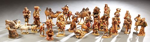 Large Thirty-two Piece Carved Wood Anri Nativity Set, 20th c., Italy, consisting of Mary, 2 Josephs, 2 camels, a donkey, 4 sheep, one shepherd with a 
