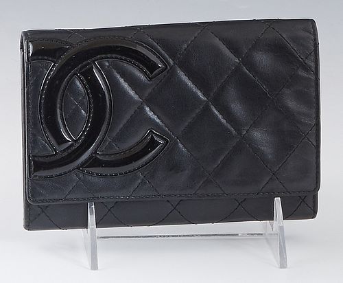 Chanel Cambon Ligne Flap Wallet, in black quilted calf leather with ruthenium hardware, the snap closure opening to a hot pink leather and logo canvas