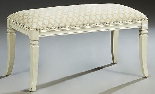 Polychromed Beech Double Bench, 20th c., the upholstered top over a wide skirt, on square splayed saber legs, in pale green and tan chain link silk fa