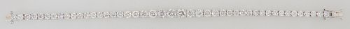 18K White Gold Diamond Link Bracelet, each of the 45 links mounted with a graduated round diamond, total diamond wt.- 9.66 cts., L.- 7 in., with appra