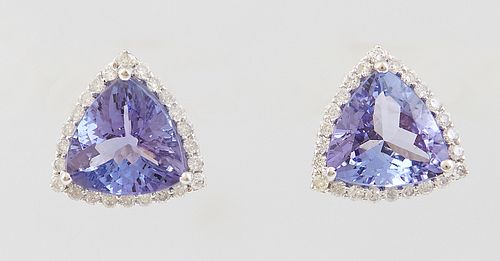 Pair of 14K White Gold Stud Earrings, each with a trillion cut 2.09 ct. tanzanite atop a border of tiny round diamonds, total tanzanite wt.- 4.18 cts.