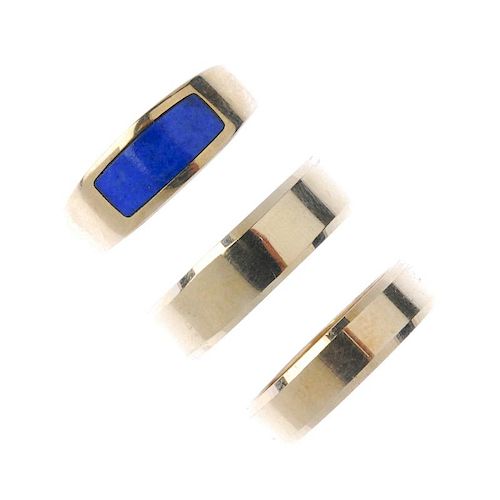A selection of three 9ct gold band rings. To include a tapered band ring with curved rectangular-sha