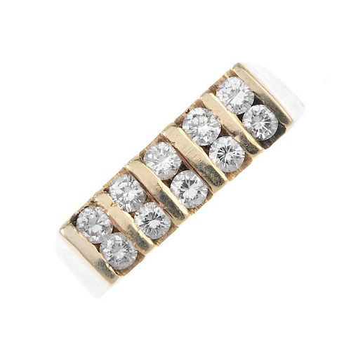 A diamond two-row ring. Designed as a two rows of brilliant-cut diamonds, with bar spacers, to the t