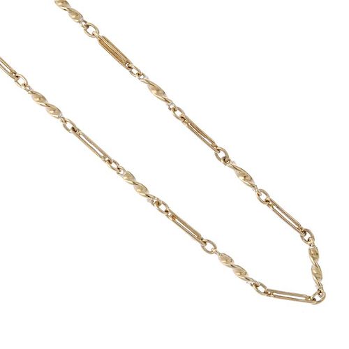 A 9ct gold fancy-link chain. Designed as a series of alternating trombone and twist links. Hallmarks