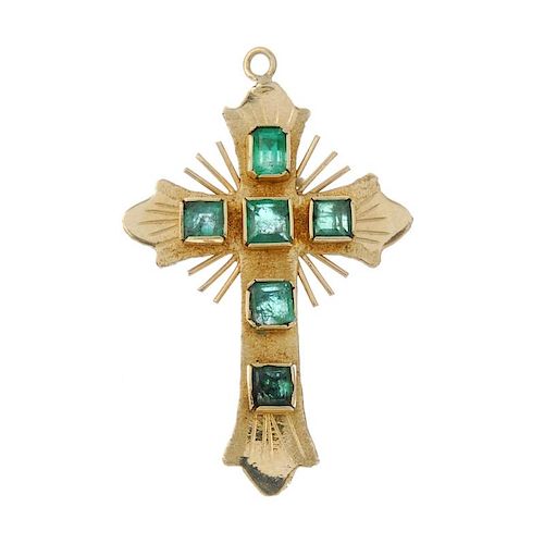 An emerald cross pendant. The square-shape emerald cross, with sunburst detail, suspended from a fin