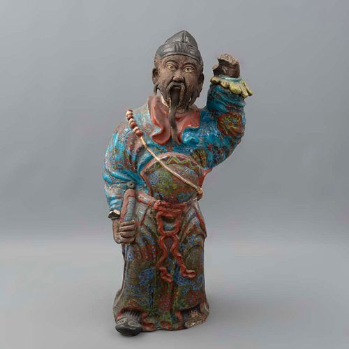 Personaje oriental. Siglo XX. En talla de madera policromada. 70 cm