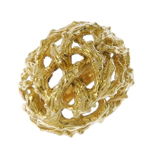 A 1970s 18ct gold ring. Of bombe design, styled as a series of intertwined textured branches. Import