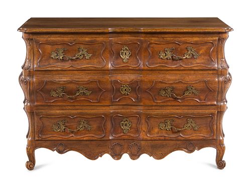 A French Provincial Shell-Carved Walnut Commode