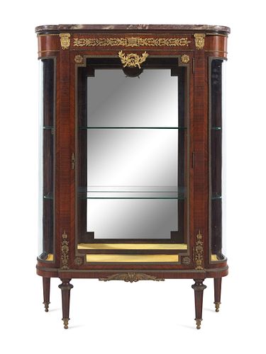 A Louis XVI Style Gilt Bronze Mounted Kingwood Veneered Marble-Top Vitrine Cabinet