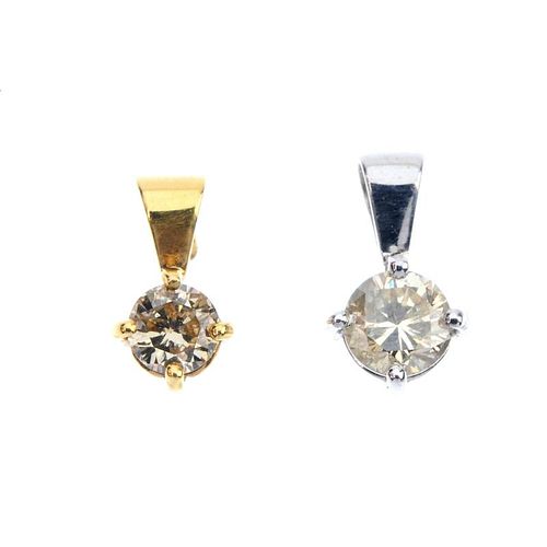 Two diamond pendants and a pair of diamond ear studs. To include an 18ct gold brilliant-cut diamond