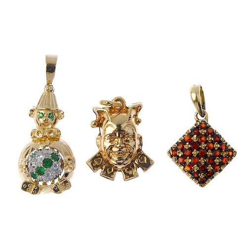 Three gem-set and paste pendants. To include a 9ct gold joker pendant, a 9ct gold cubic zirconia and