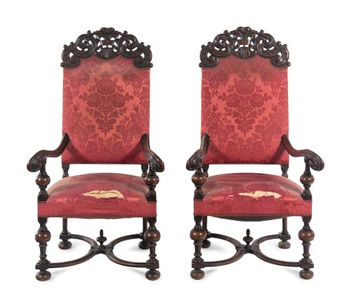 A Pair of William and Mary Style Carved Walnut Armchairs
