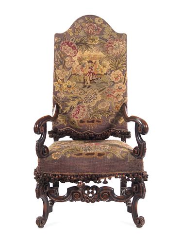 A William and Mary Style Carved Walnut Armchair with Needlepoint Upholstery