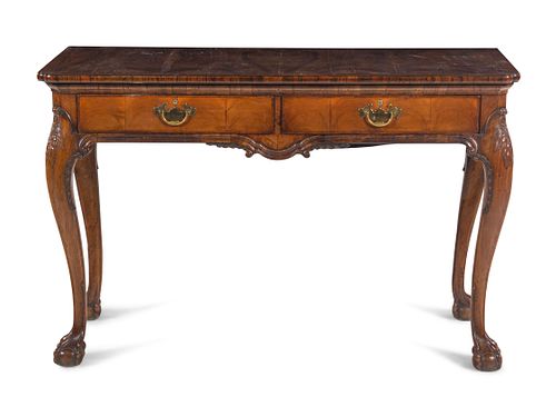 A George III Carved Mahogany Writing Table