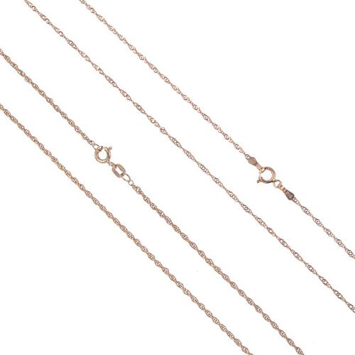 Two chains. Each designed as a rope-twist chain, to the spring clasp. Lengths 48 and 49cms. Total we