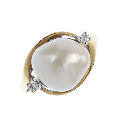 A cultured pearl and diamond dress ring. The freshwater cultured pearl, with brilliant-cut diamond s