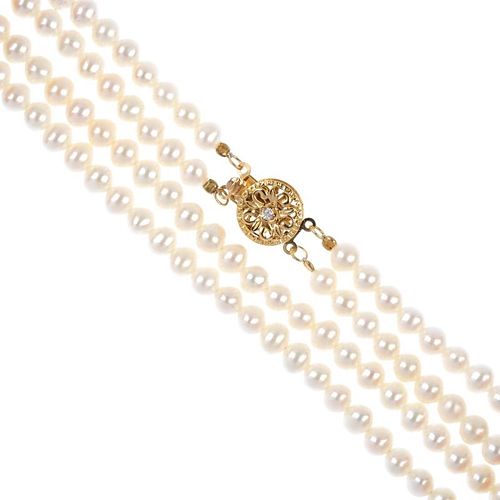 A freshwater cultured pearl two-row necklace. Each row comprising a series of uniform freshwater cul