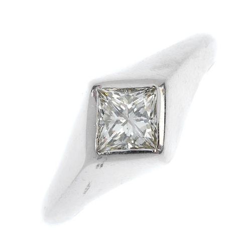 A 9ct gold diamond single-stone ring. The square-shape diamond, inset to the plain band. Estimated d