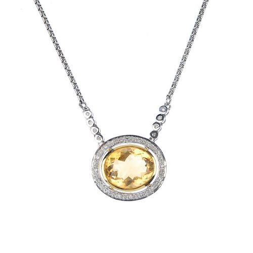 An 18ct gold citrine and diamond cluster necklace. The oval-shape citrine collet, within a single-cu