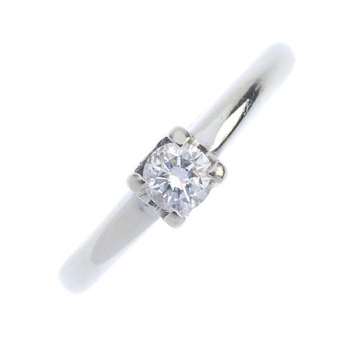 An 18ct gold diamond single-stone ring. The brilliant-cut diamond, to the tapered band. Estimated di