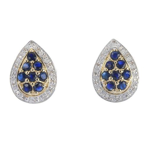 A pair of 9ct gold sapphire and diamond cluster ear studs. Each designed as a circular-shape sapphir