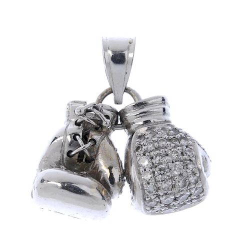 A diamond boxing gloves pendant. Designed as two brilliant-cut diamond boxing gloves, to the tapered