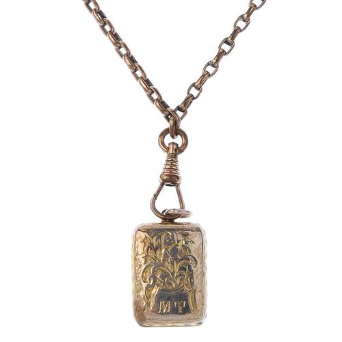 A late Victorian locket, with chain. The rectangular-shape locket with foliate front and back, suspe