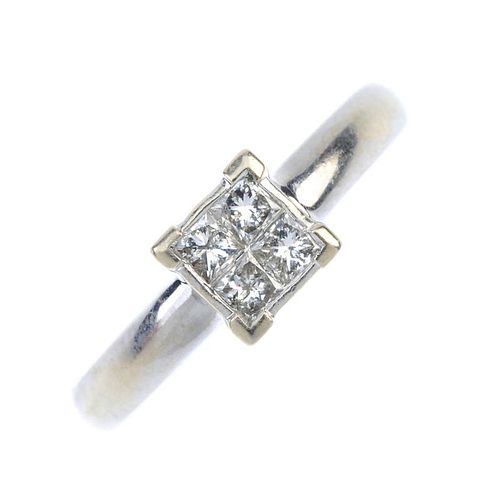 A diamond four-stone ring. The square-shape diamond four-stone panel, to the plain band. Total diamo