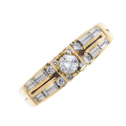 A diamond dress ring. The brilliant-cut diamond, with similarly-cut diamond highlights, to the bague