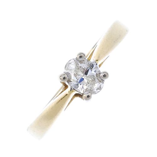 An 18ct gold diamond single-stone ring. The oval-shape diamond, to the tapered band. Diamond weight