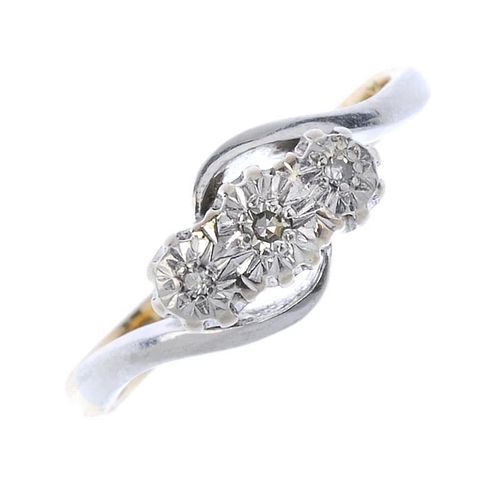 A diamond three-stone ring. The graduated single-cut diamond line, each within an illusion settings,