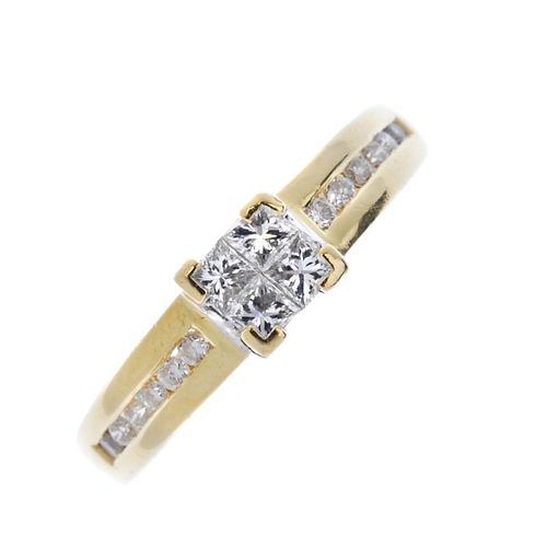 An 18ct gold diamond ring. The square-shape diamond panel, to the brilliant-cut diamond line shoulde