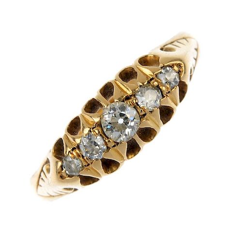 A late 19th century 18ct gold diamond five-stone ring. The slightly graduated old-cut diamonds, with