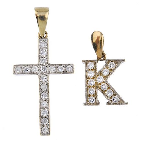 Two cubic zirconia pendants and a chain. To include a cross pendant and a letter 'K' pendant, each s