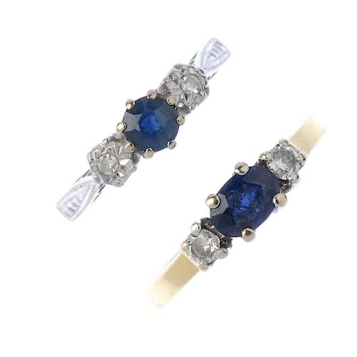 Two sapphire and diamond three-stone rings. To include an 18ct gold circular-shape sapphire and sing
