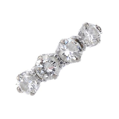 A diamond four-stone ring. The brilliant-cut diamond line, to the plain band. Estimated total diamon