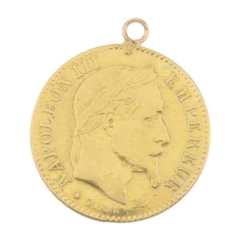 A mounted Napoleon III 10 Franc coin, dated 1864. Length 2.1cms. Weight 3.1gms. <br><br>Overall cond