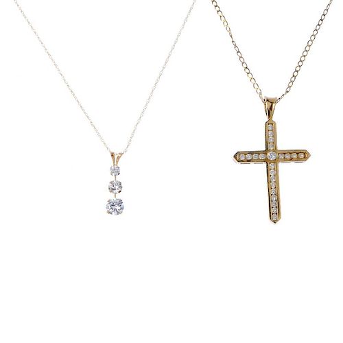 A selection of jewellery. To include a 9ct gold cubic zirconia cross pendant and flat curb-link chai