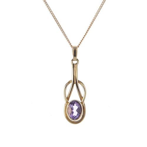 A selection of jewellery. To include an oval-shape amethyst single-stone pendant and chain, a pair o