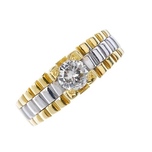 A gentleman's 18ct gold diamond single-stone ring. Of bi-colour design, the brilliant-cut diamond, t