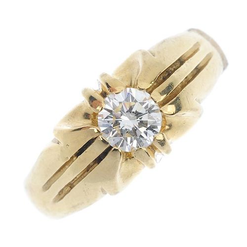 A gentleman's 18ct gold diamond single-stone ring. The brilliant-cut diamond, within an extended cla
