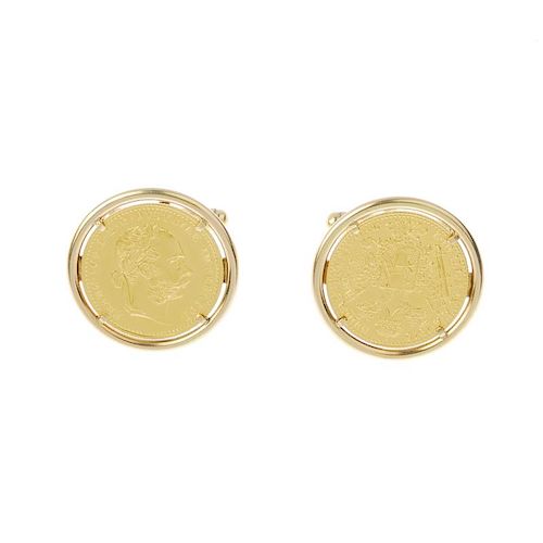 A pair of 18ct gold mounted coin cufflinks. Each designed as an Austrian Franc re-strike, dated 1915