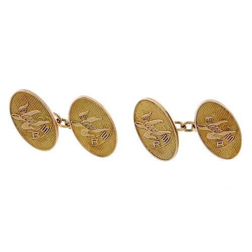 A pair of 1960s 9ct gold cufflinks. Each designed as two oval-shape panels, with stylised figure and