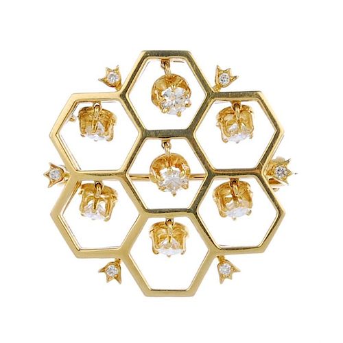 (536178-4-A) An 18ct gold diamond brooch. Of openwork design, comprising a series of brilliant-cut d