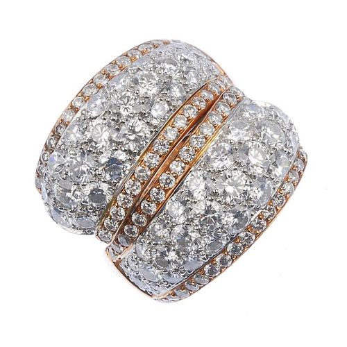(539295-1-A) A diamond dress ring. Comprising two pave-set diamond tapered panels, each with brillia