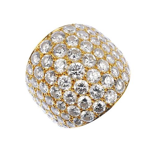 (539584-1-A) A diamond dress ring. The pave-set diamond bombe panel, to the tapered band. Signed Zel