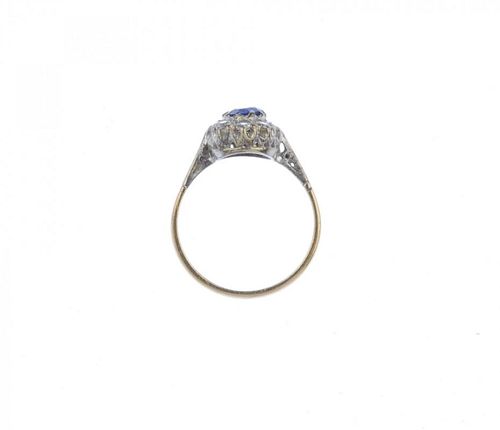 (539672-1-A) Two 9ct gold gem-set rings. To include a sapphire and colourless paste three-stone ring