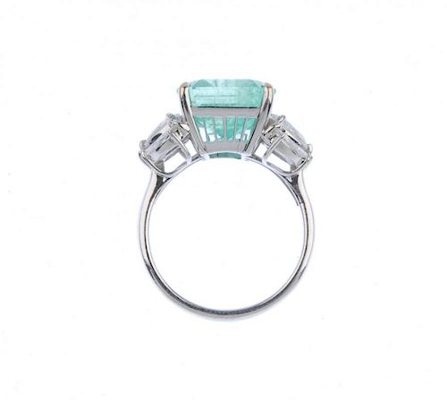 (539726-3-A) An emerald and diamond dress ring. The rectangular-shape emerald, with pear and marquis