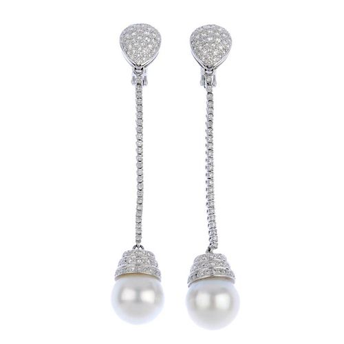 (539860-3-A) A pair of cultured pearl and diamond ear pendants. Each designed as a cultured pearl, m